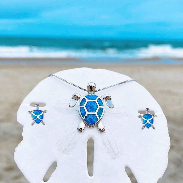 Sjöturtlesmyckeset med halsband och örhängen i opal och silver