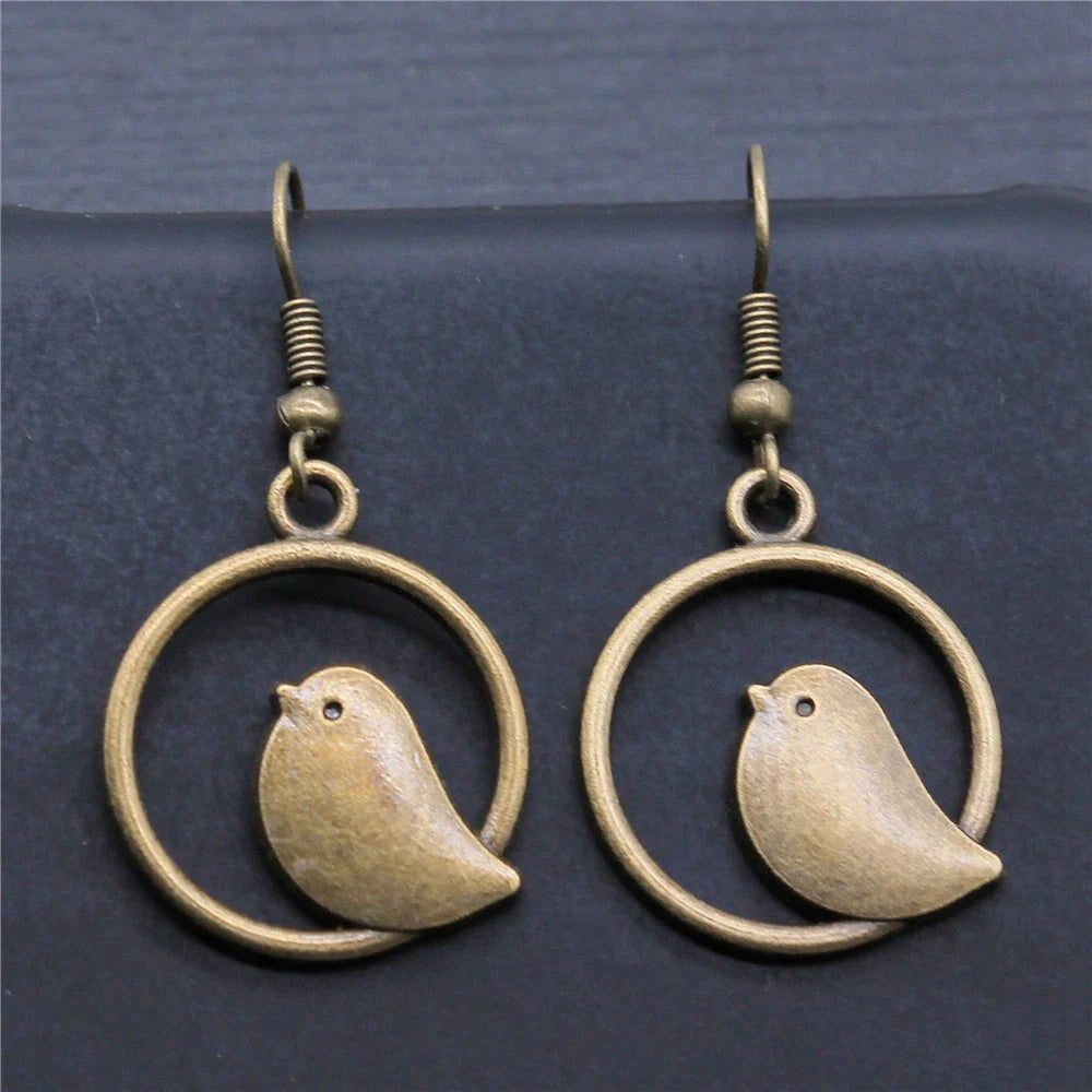 Vintage fågel charm droppörhängen – handgjorda boho-smycken