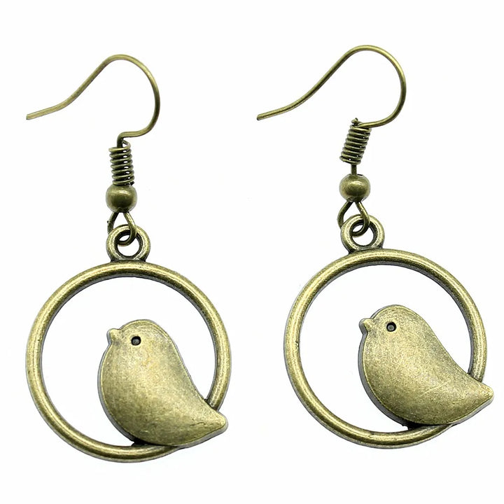 Vintage fågel charm droppörhängen – handgjorda boho-smycken