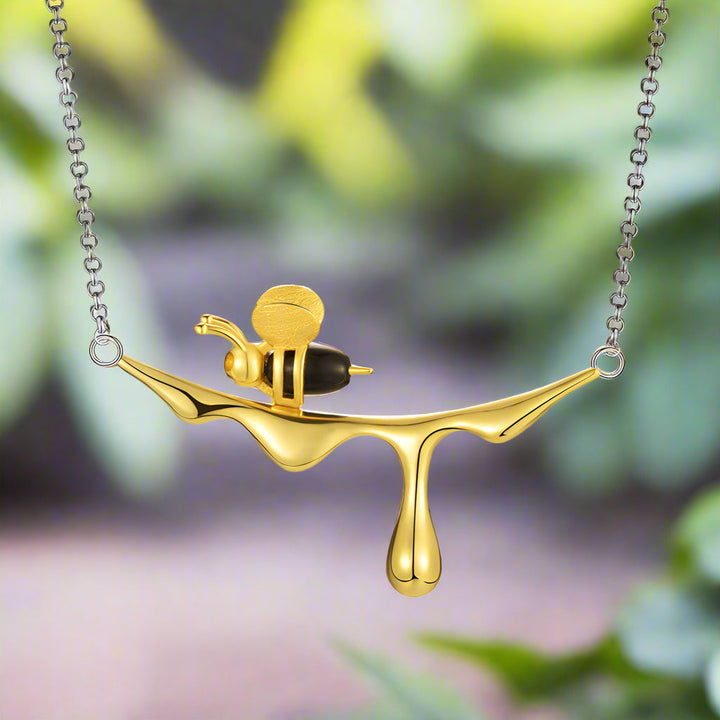 Droppande honung och bi halsband