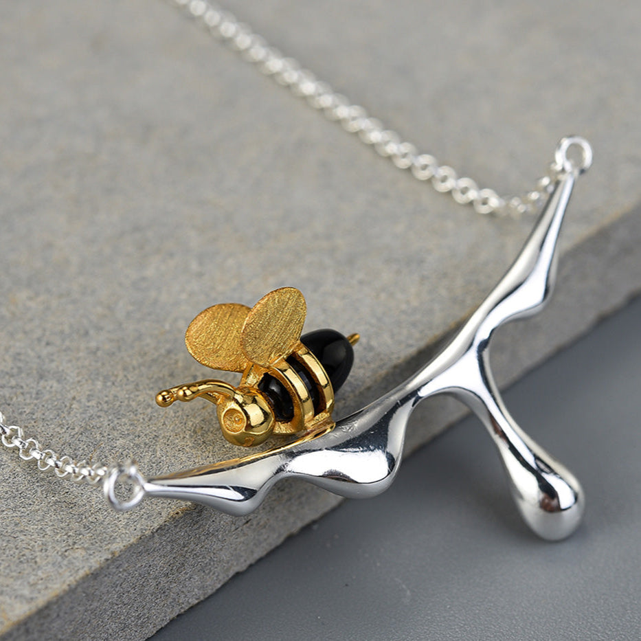 Droppande honung och bi halsband