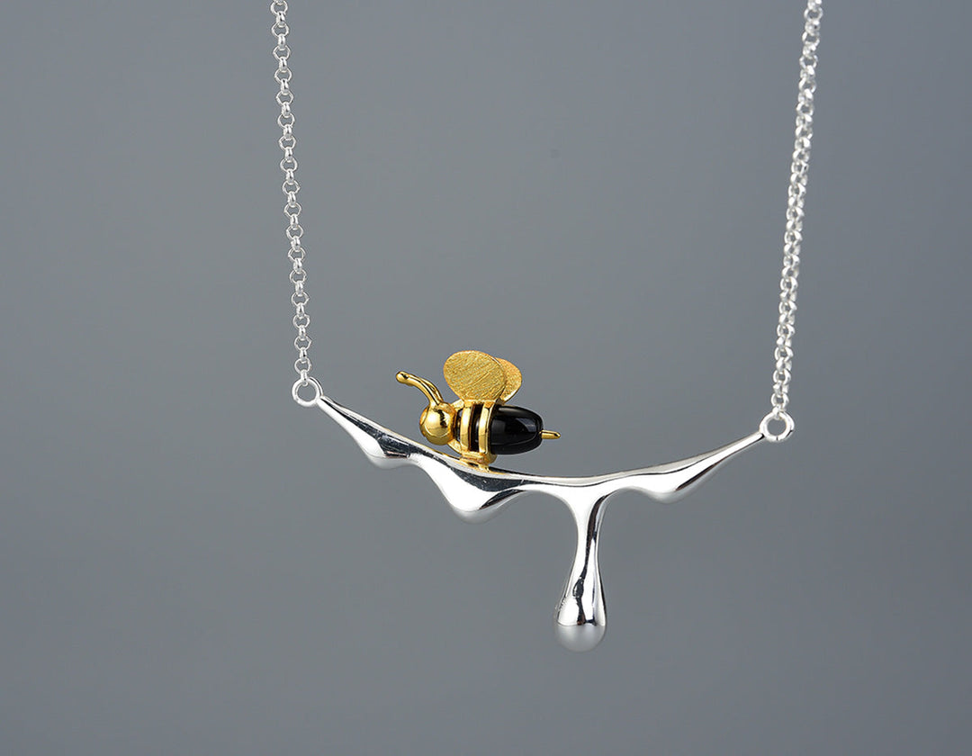 Droppande honung och bi halsband