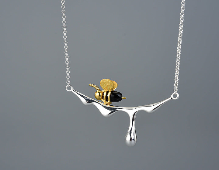 Droppande honung och bi halsband