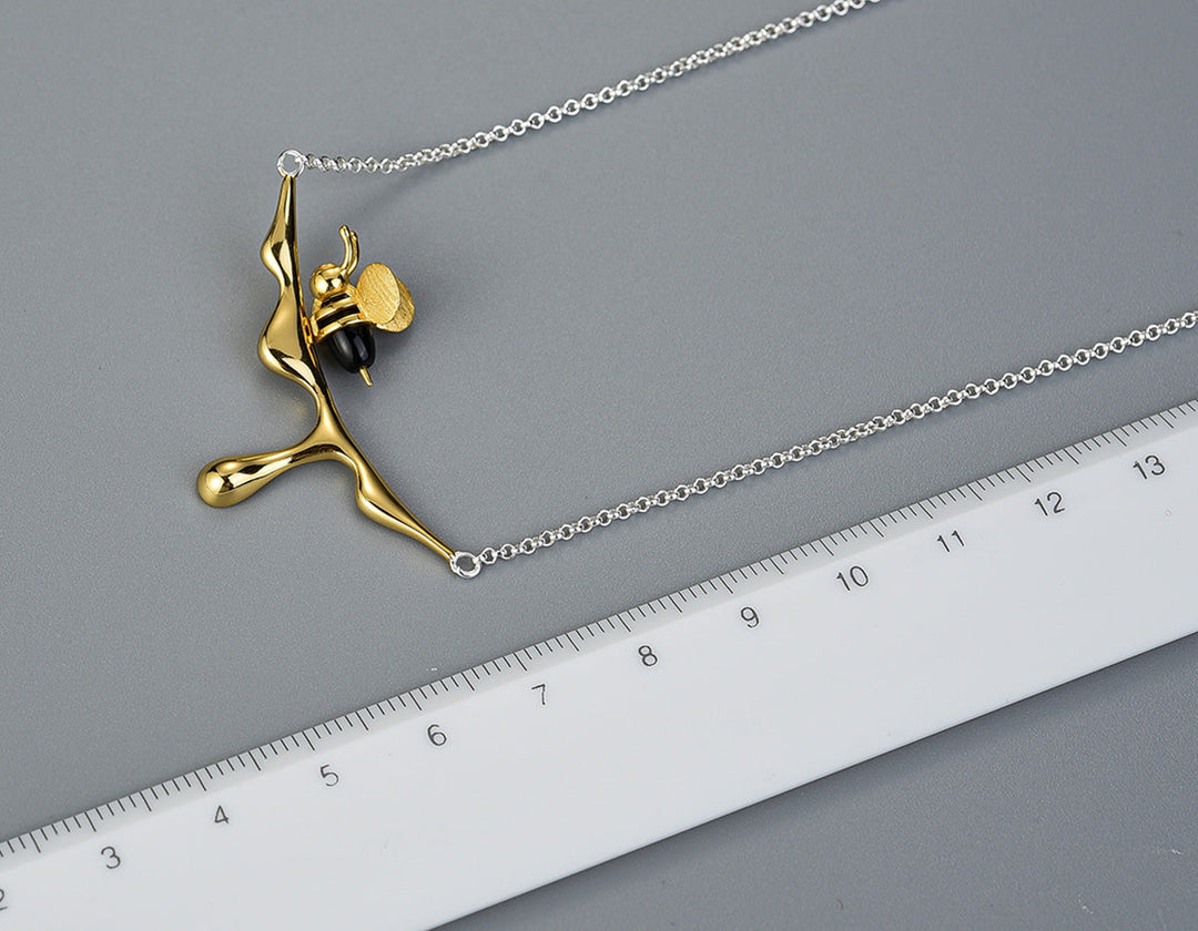 Droppande honung och bi halsband