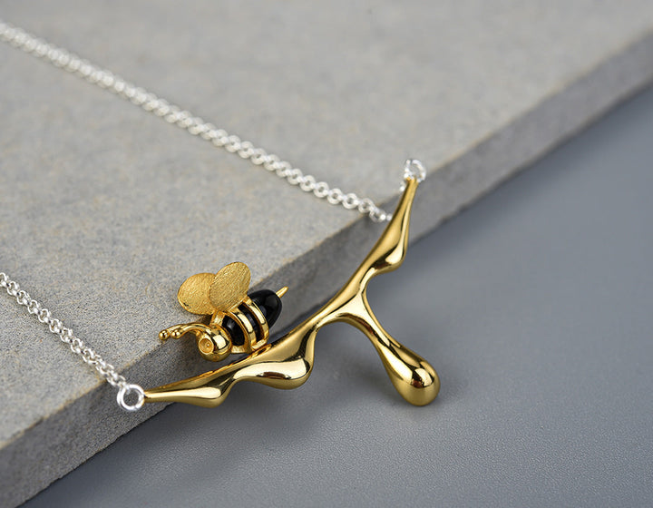 Droppande honung och bi halsband