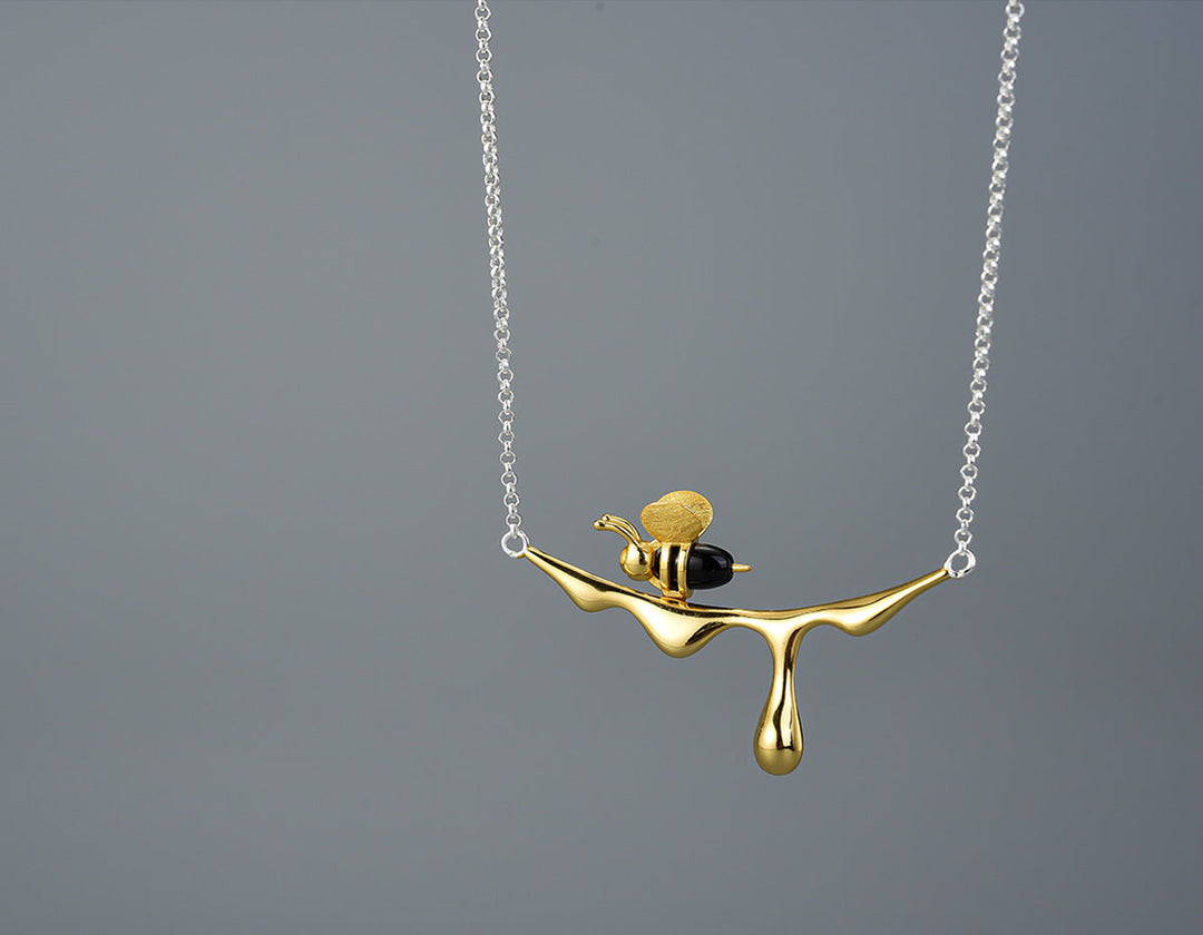 Droppande honung och bi halsband