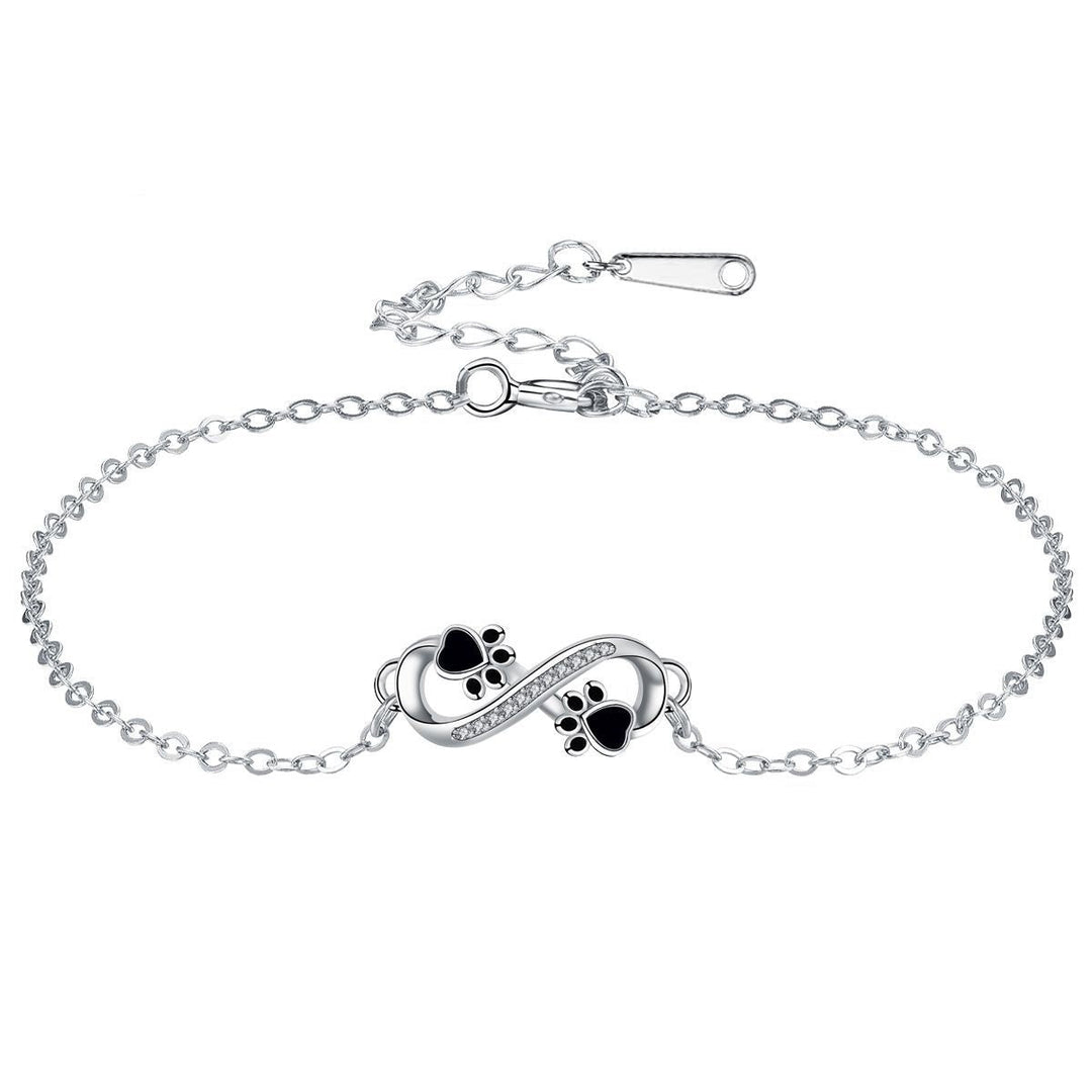 Infinite symbolhalsband med tassarmband med zirkonior