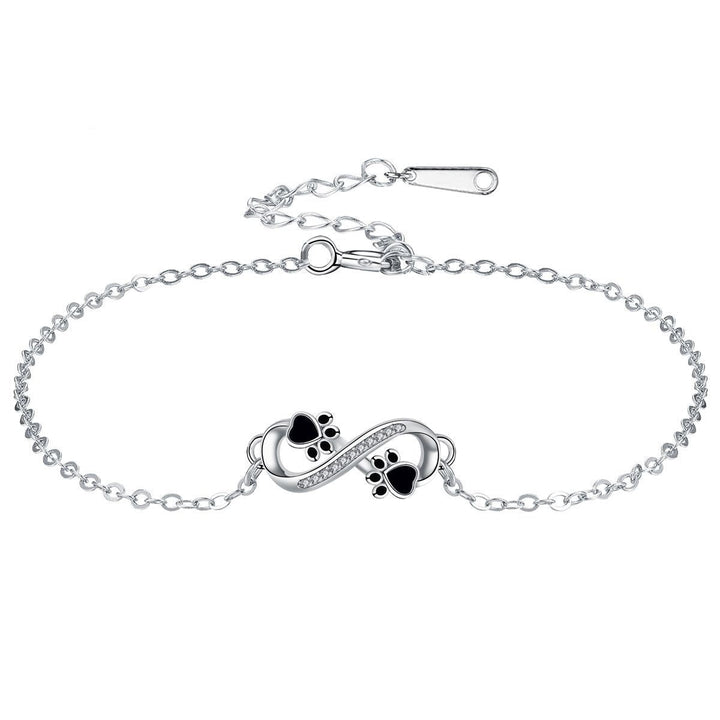 Infinite symbolhalsband med tassarmband med zirkonior