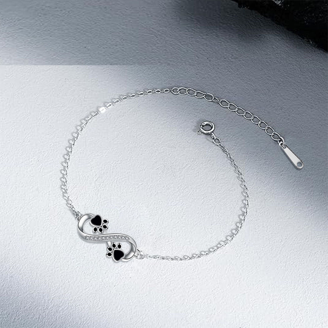 Infinite symbolhalsband med tassarmband med zirkonior