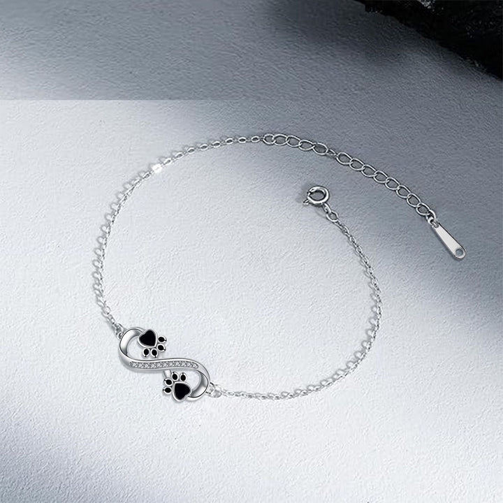Infinite symbolhalsband med tassarmband med zirkonior