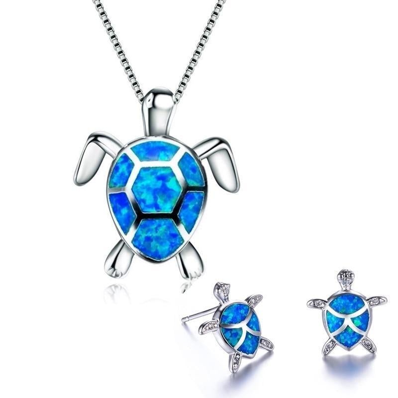 Sjöturtlesmyckeset med halsband och örhängen i opal och silver