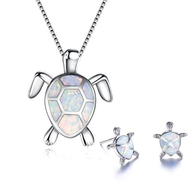 Sjöturtlesmyckeset med halsband och örhängen i opal och silver